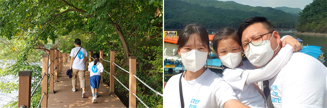 온 가족이 함께 희망걷기대회 티셔츠를 입고 호수를 걷고 있는 모습